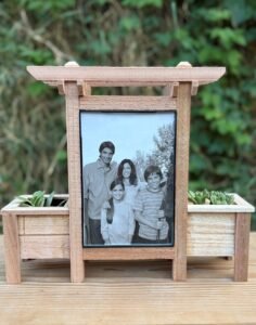 A face front picture of a double photo trellis planter.