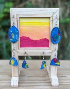 Custom Cedar made jewelry earring holder.